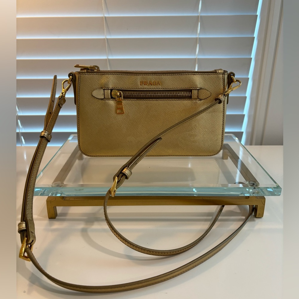 PRADA saffiano leather gold crossbody bag.
